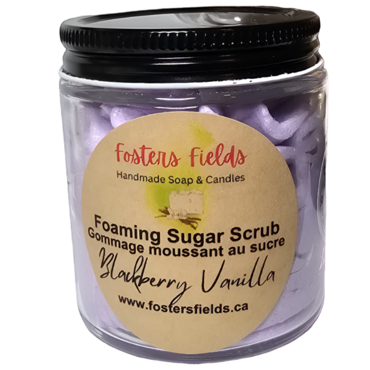 Purple sugar scrub with a foaming texture, scented with blackberry and vanilla, in a clear jar.