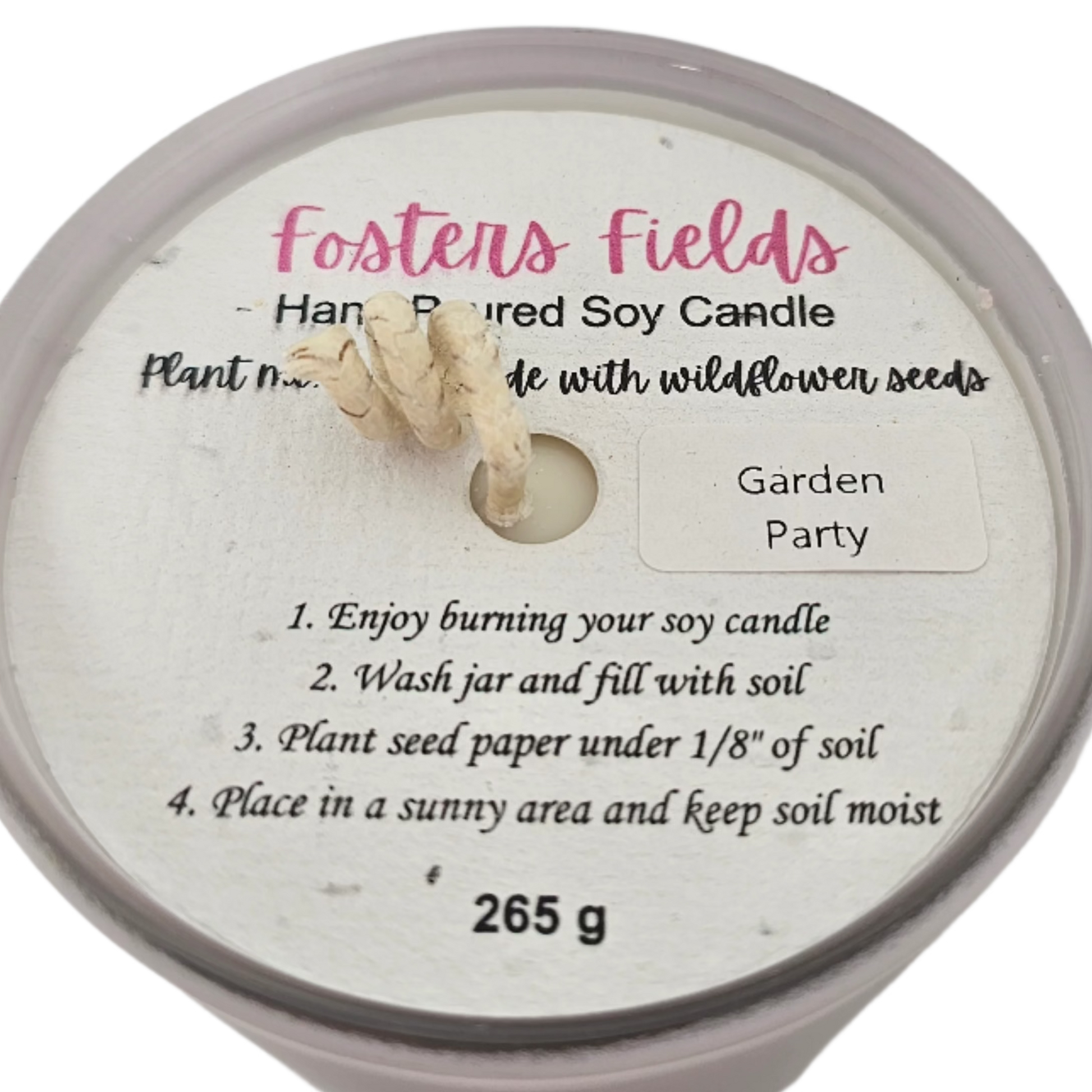 Candle in pale purple glass, scented with soft, glitter-kissed florals for a modern spring vibe