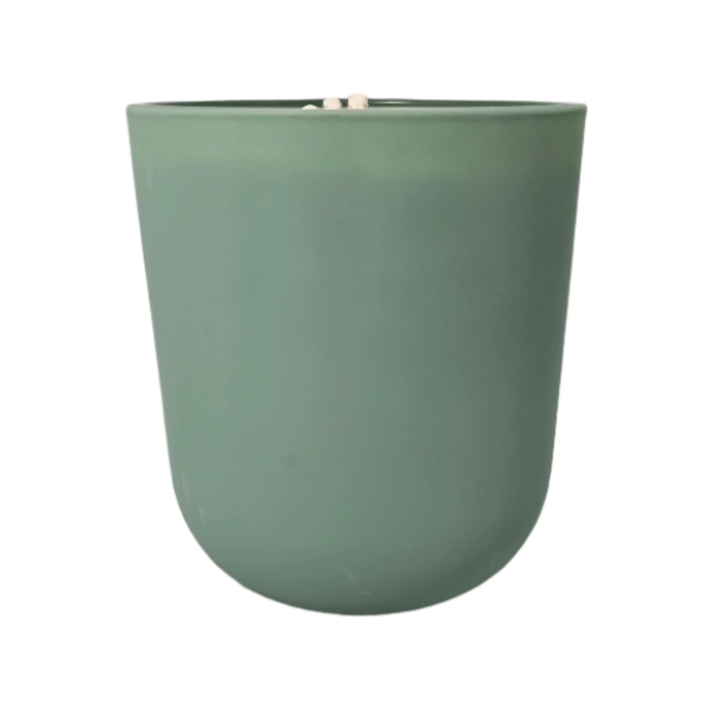 Earthy soy candle in green glass jar, inspired by the serene Muskoka wilderness