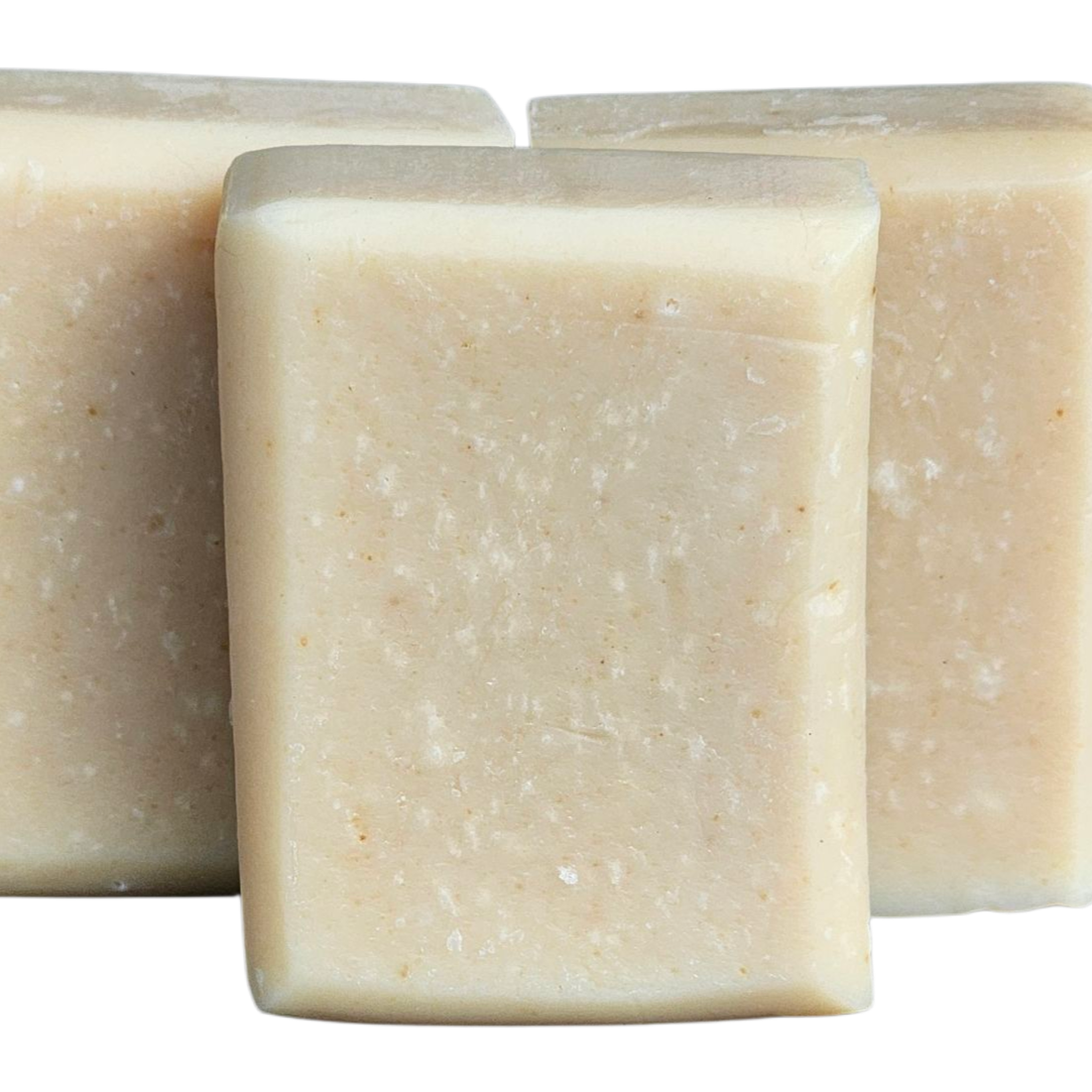 Three square bars of soap on a white background, tumeric soap, facial soap, gentle