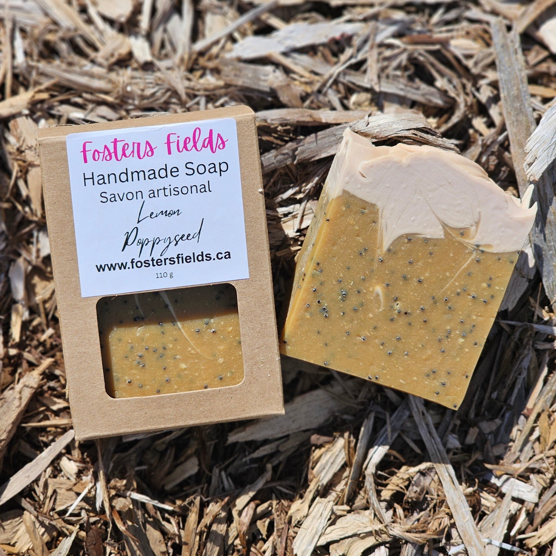 Handmade bar soap, packaged in a kraft box, yellow with white swirled top, Lemon Poppyseed soap