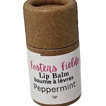 Peppermint lip balm in a small brown container with a white label that reads 'Foster's Fields Lip Balm peppermint 5g'.