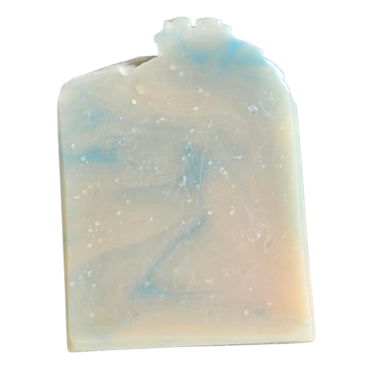 Iridescent soap bar on a white background