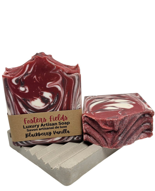 handmade soap scented in blackberry vanilla, color is red black and white