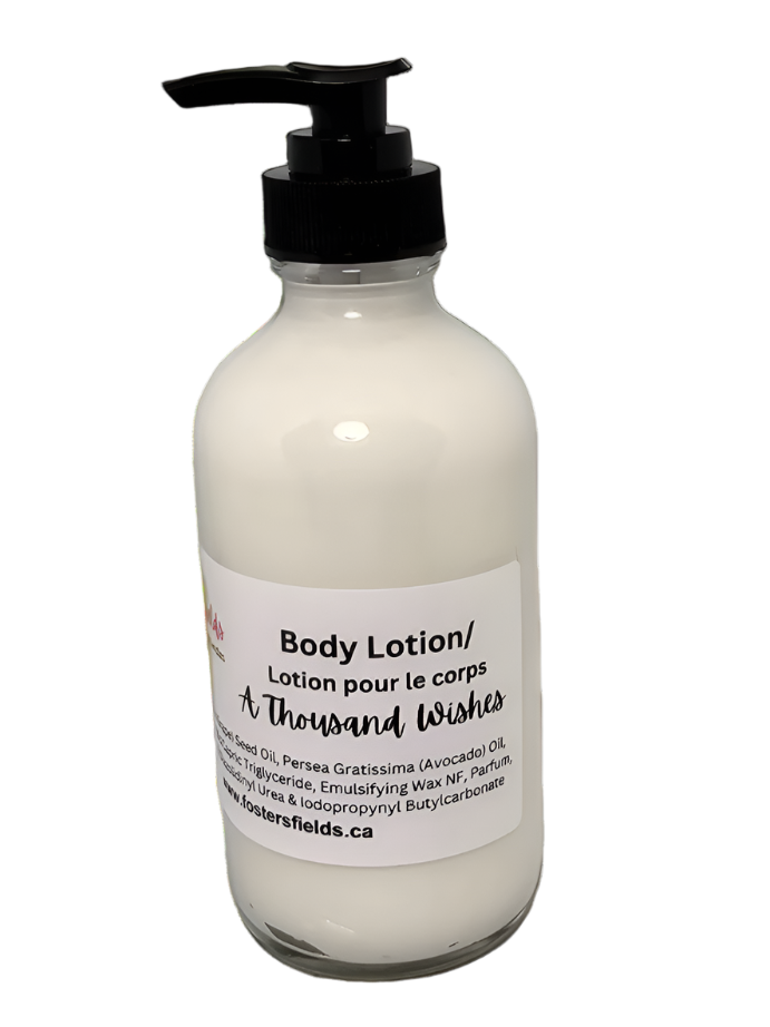 Handmade lotion scented with A Thousand Wishes, packaged in a clear bottle.