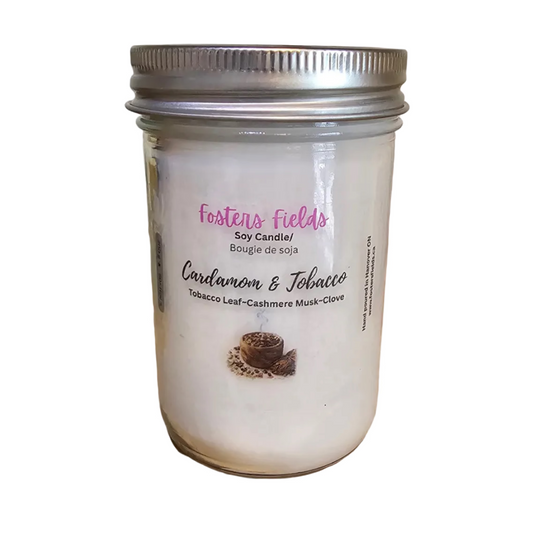 White soy wax, poured into a 8oz jar. Cardamom and Tabacco scent, finished with a clear label displaying the candle information