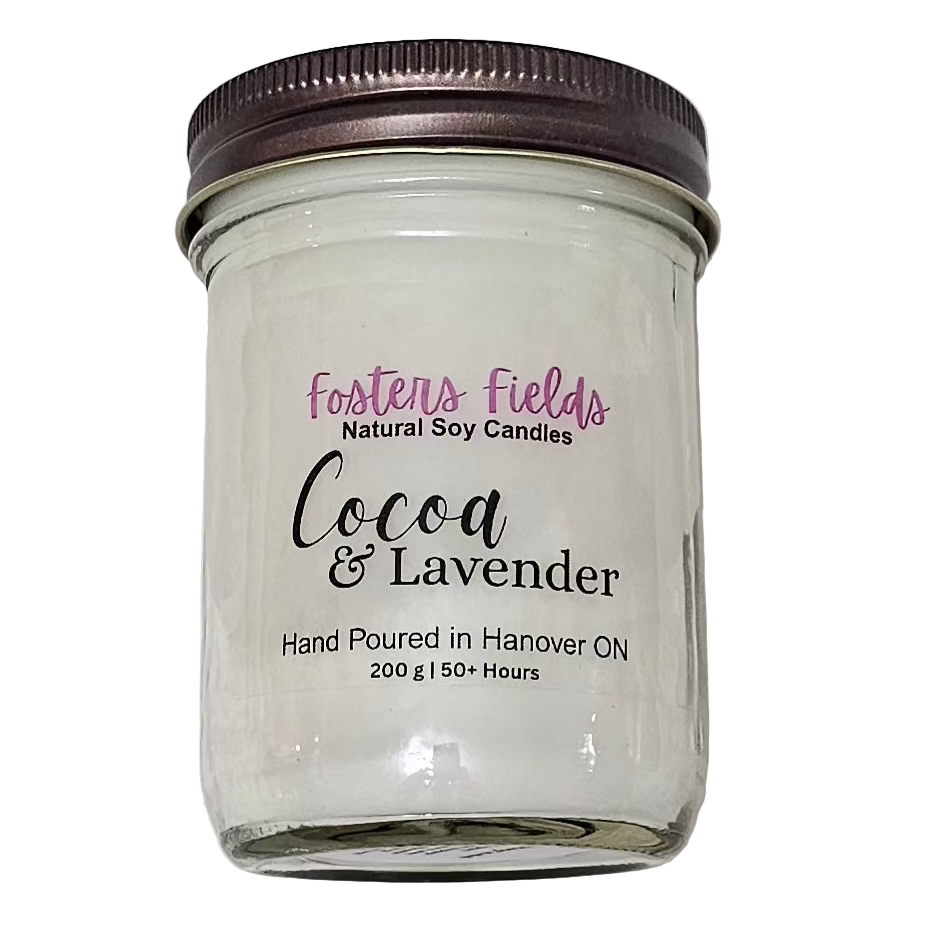white soy wax poured into a jam jar with a copper lid, scented with a blend of cocoa and lavender, simple clear label