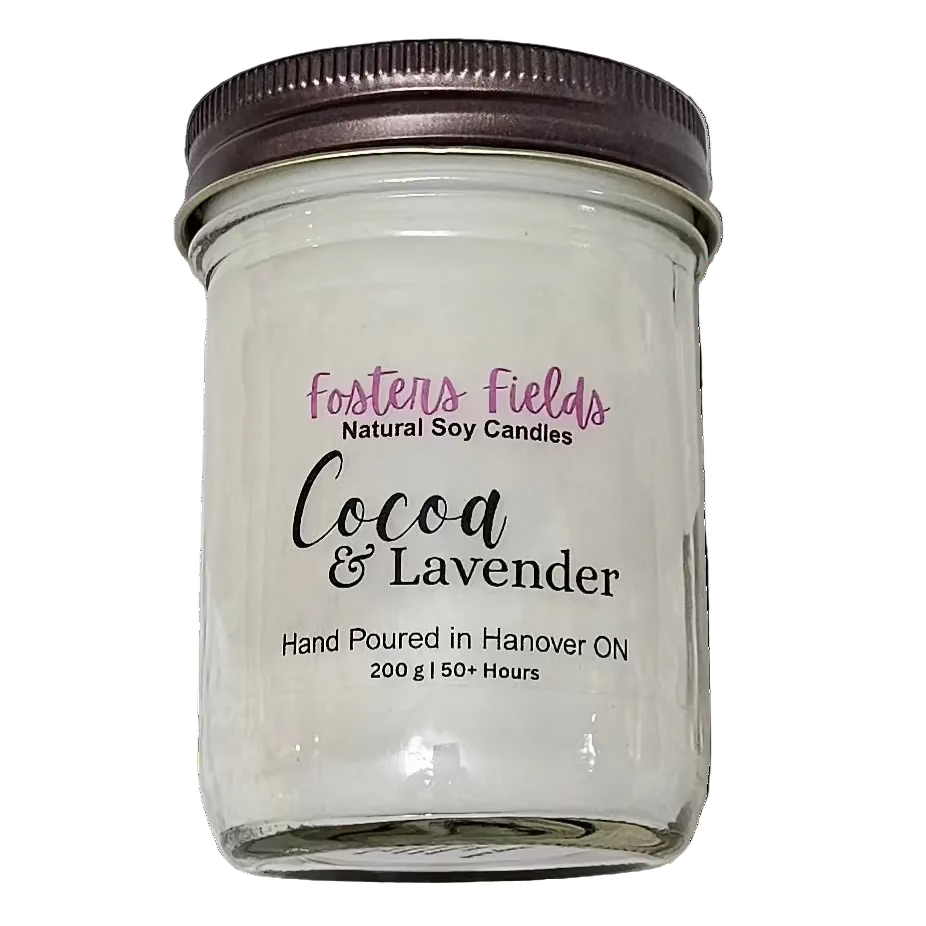 white soy wax poured into a jam jar with a copper lid, scented with a blend of cocoa and lavender, simple clear label
