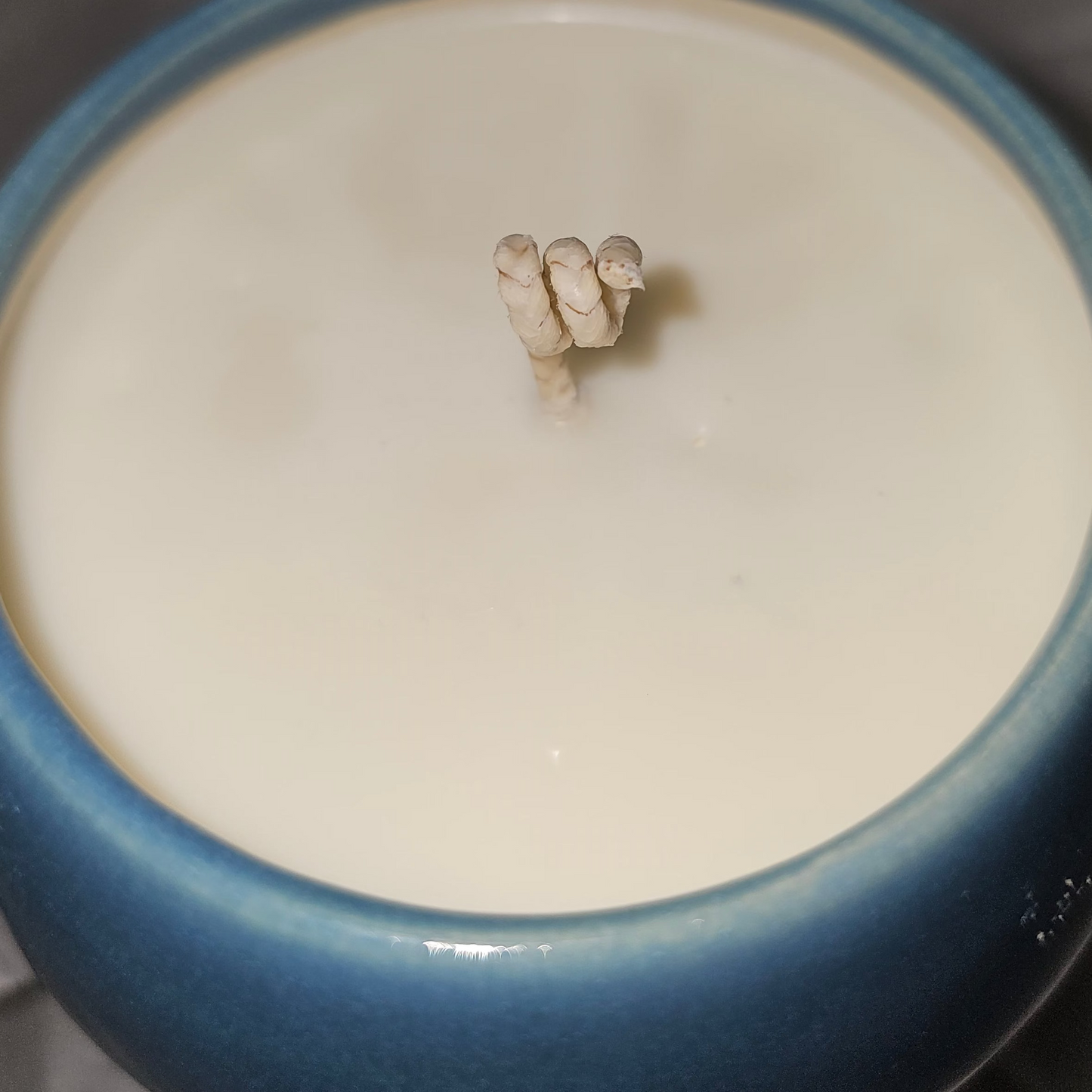 blue pottery vessel, upcycled soy candle top