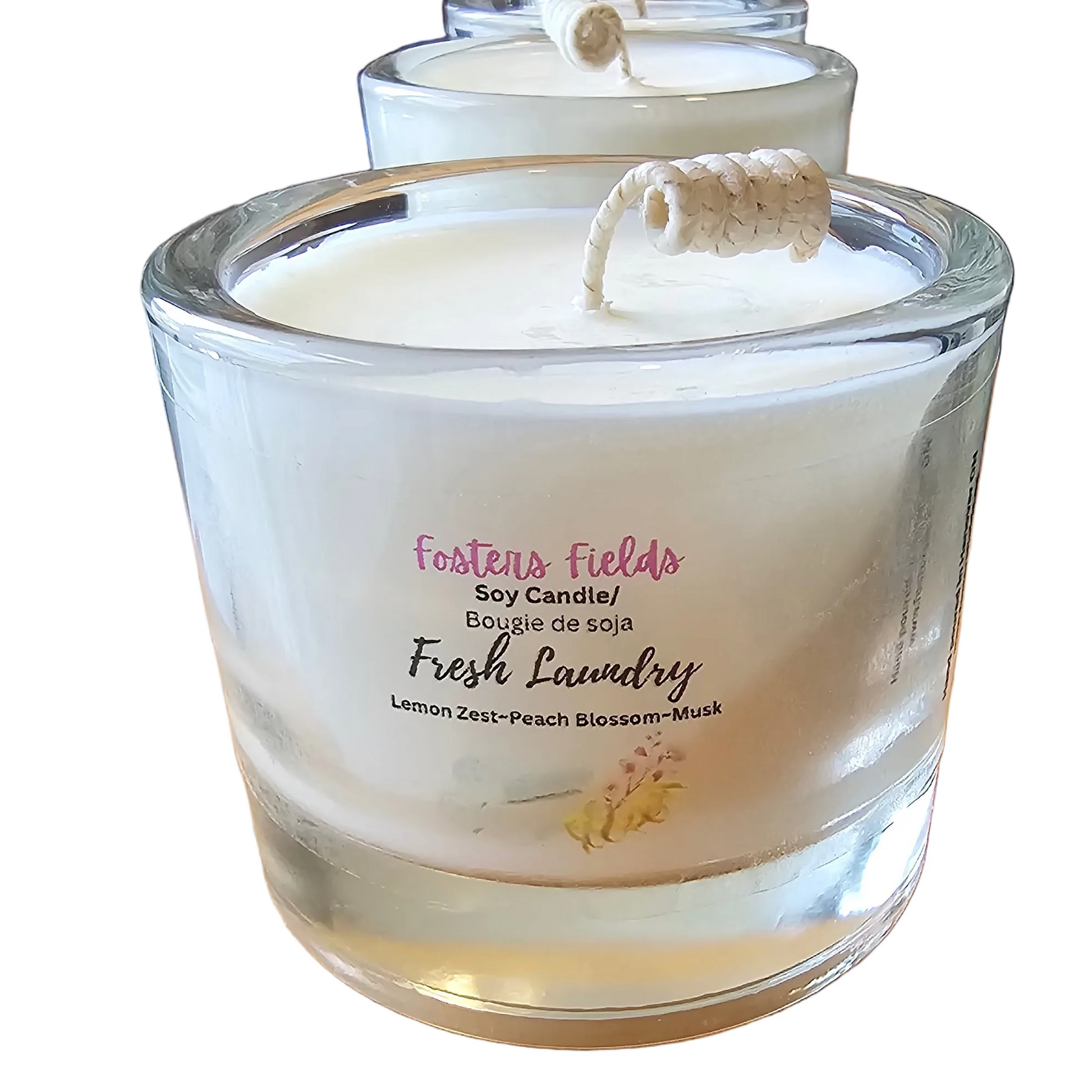 Glass candle with a label , with a white background.