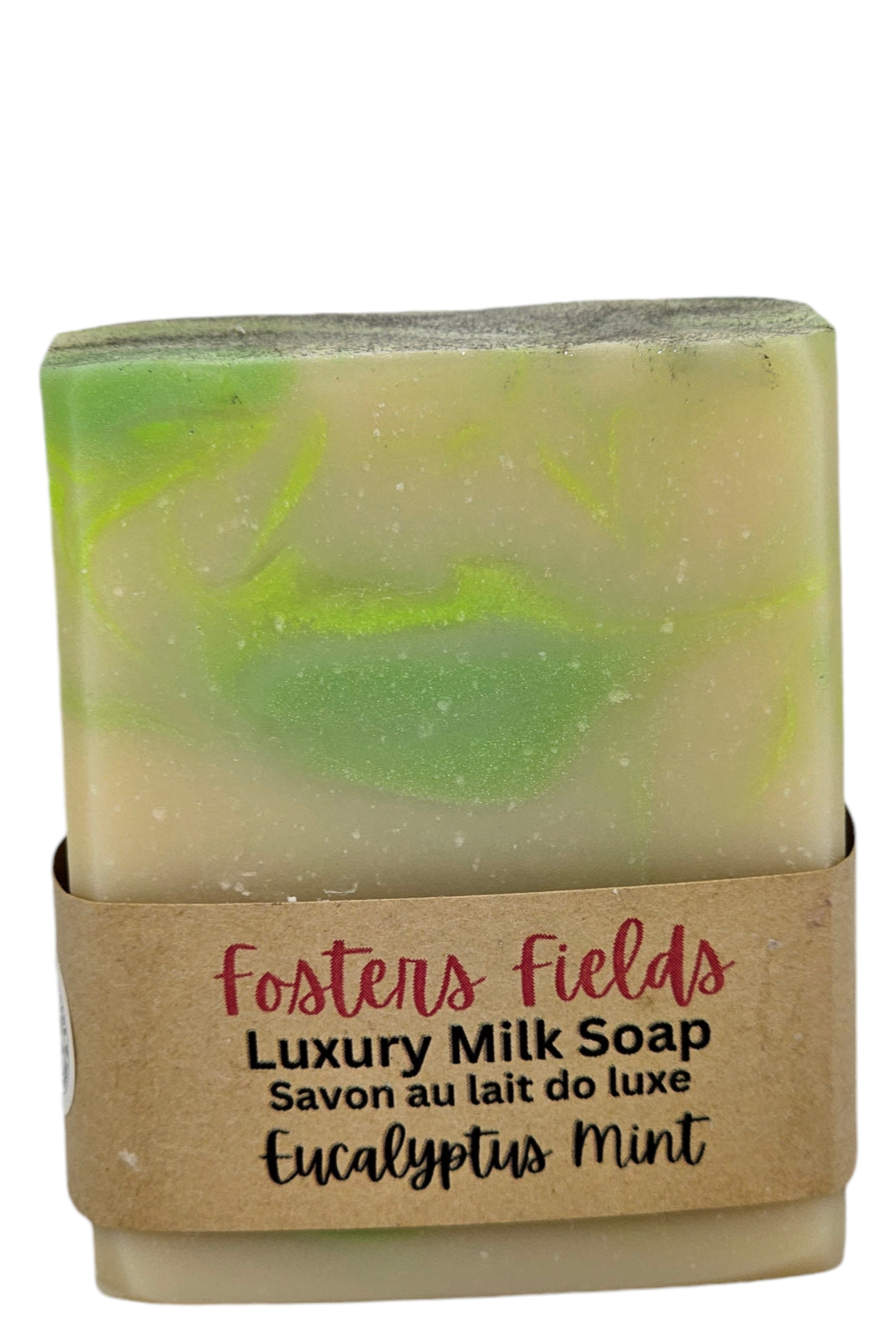 A bar of Eucalyptus Mint soap with essential oils, showcasing a vibrant swirl pattern of bright greens and white. The fresh and invigorating colors blend together, creating a dynamic and refreshing design reminiscent of a revitalizing minty breeze.