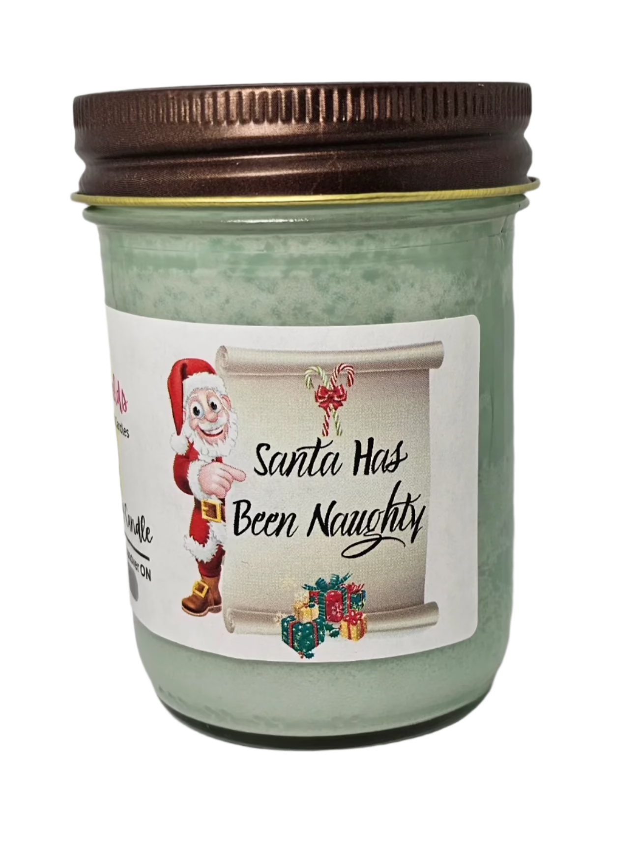 holiday candle scented in pine and tobacco, green