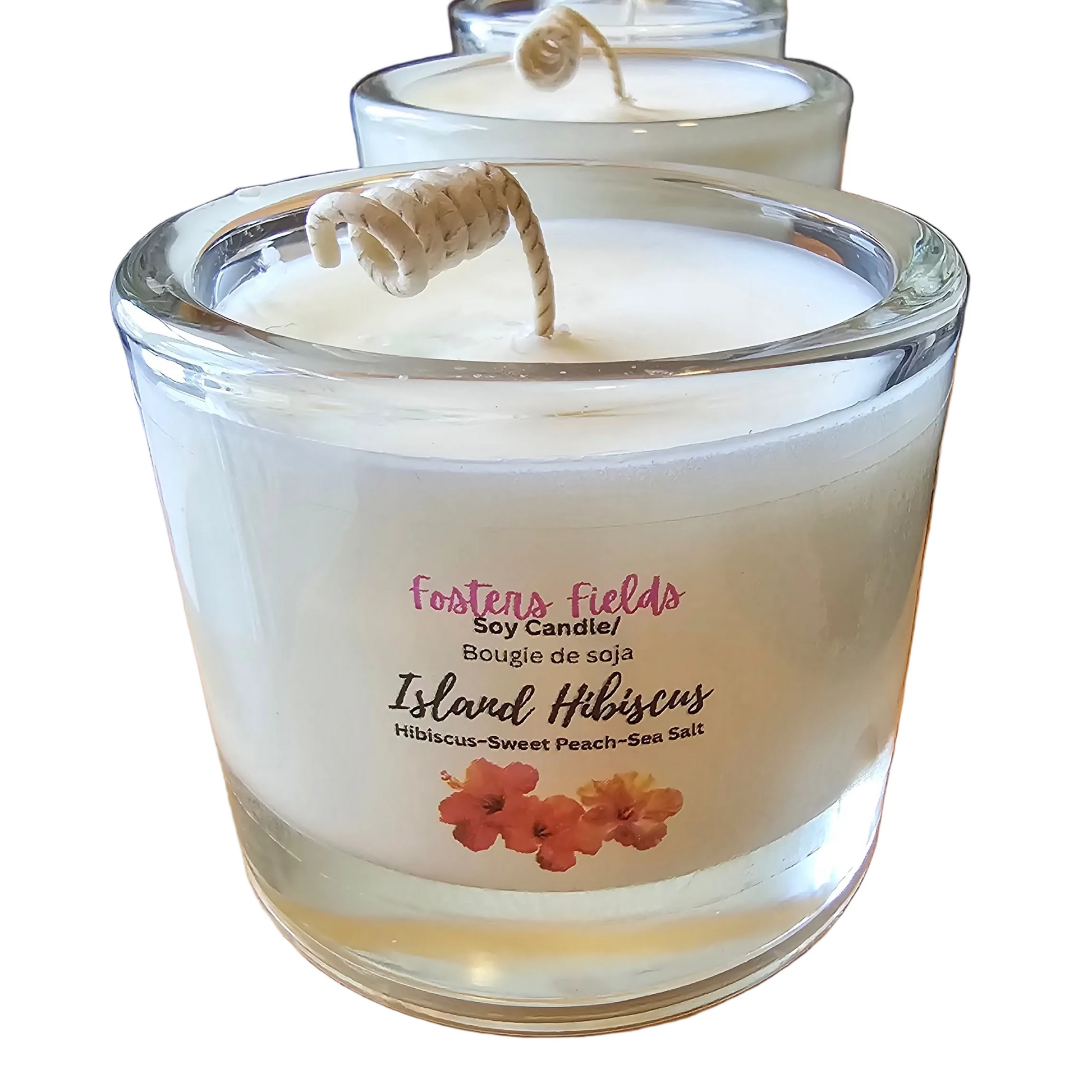 Glass candle with a label on a white surface, white background