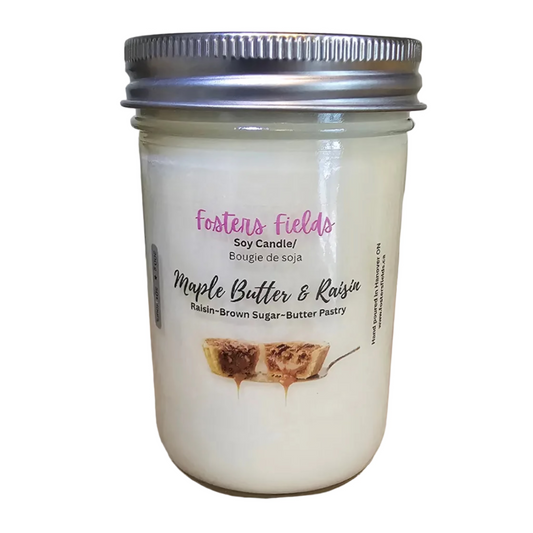 8oz jar filled with white soy wax and labelled with a clear Fosters Fields Candle label. Raisin Butter Tart