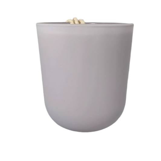 Delicate soy candle in pale purple jar, scented with gentle florals and a hint of sparkle

