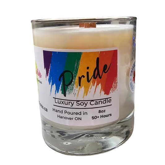 Soy Candle poured in a glass jar with a rainbow pride label,