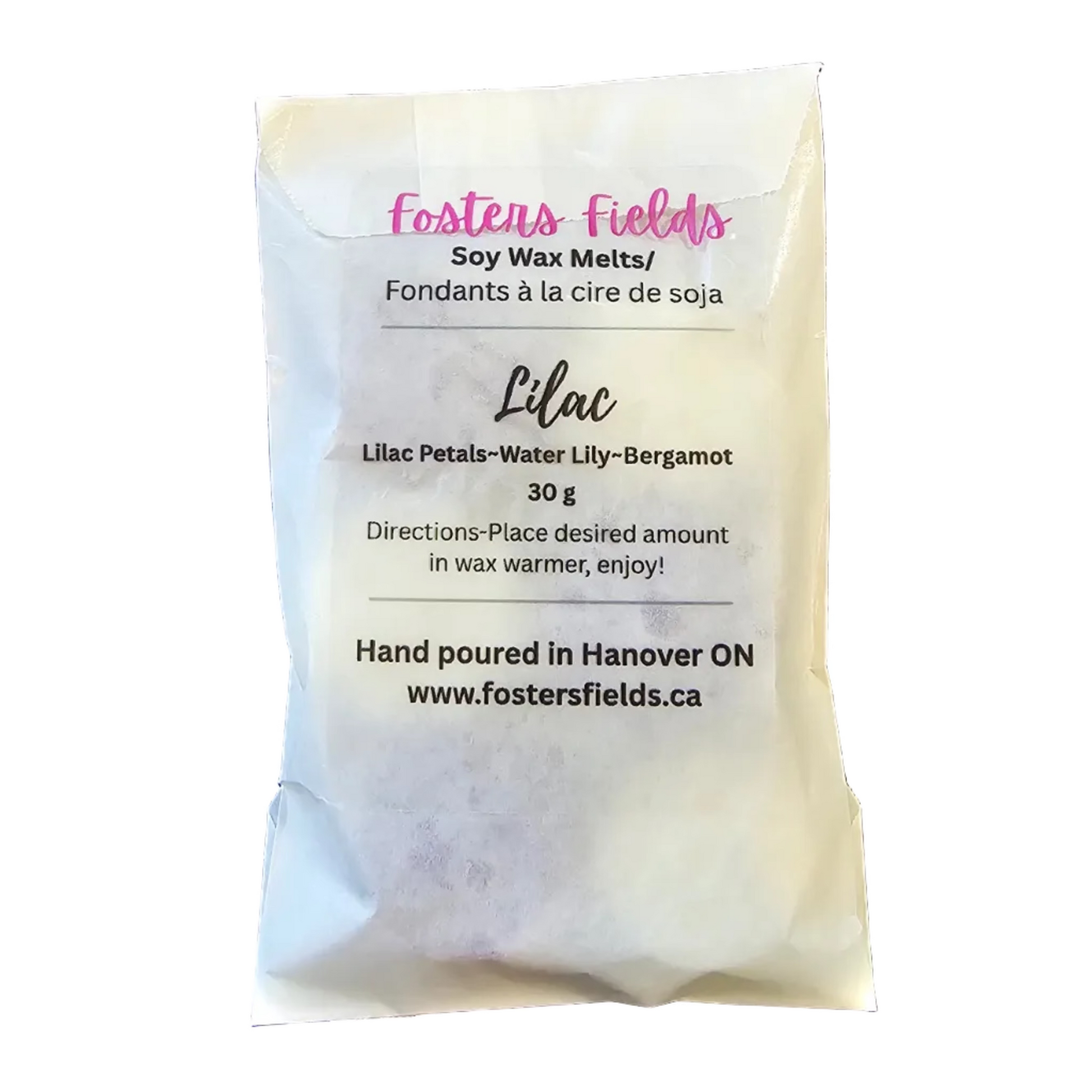 Foster's Fields soy wax melt packet on a white surface, glassine bag with clear label
