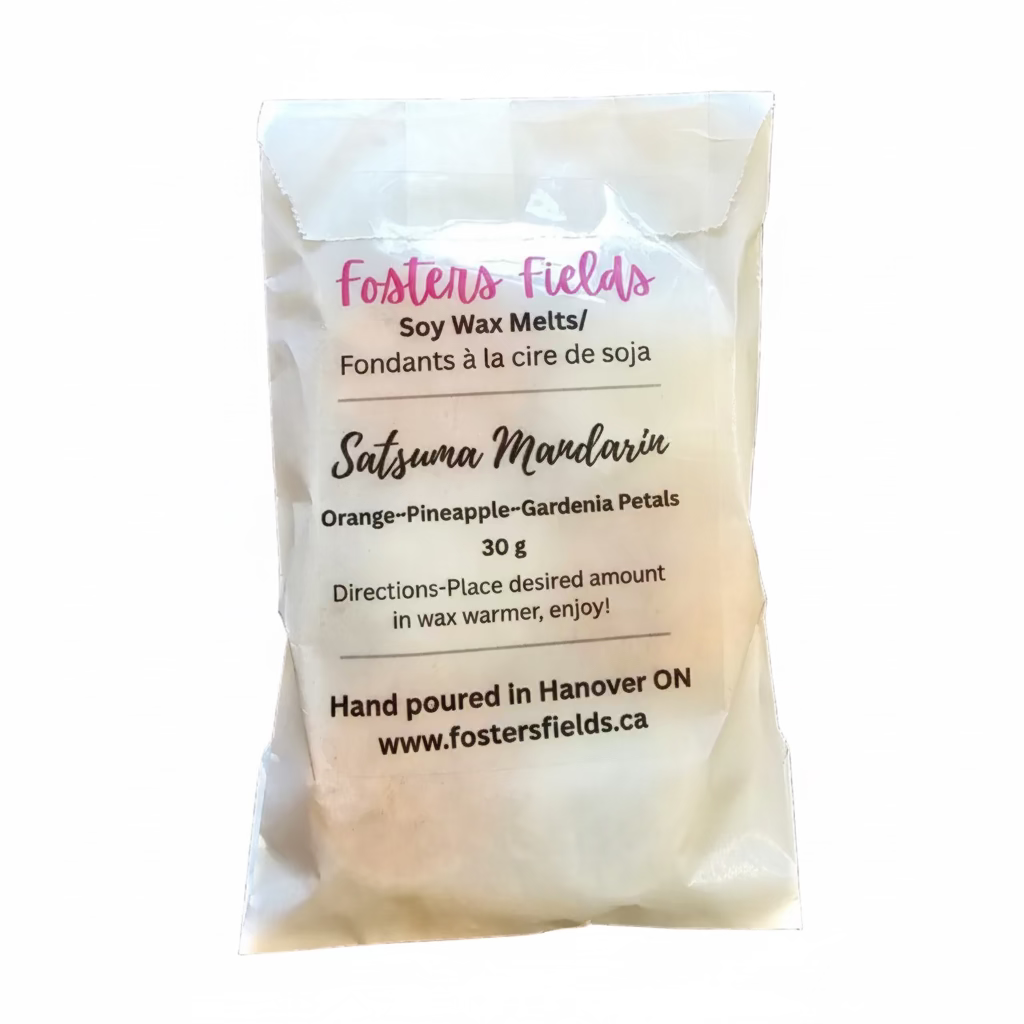 tiny flower soy wax scented with orange, packaged in glassine bag with a clear sticker label stating Fosters Fields