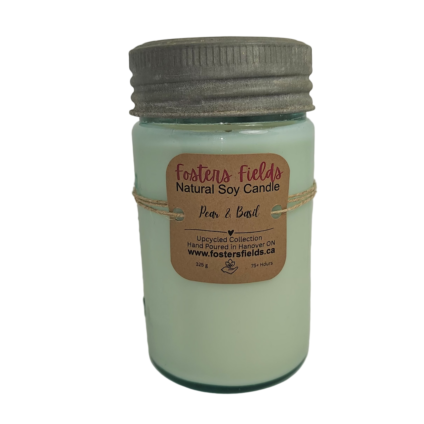 Jar of Foster's Fields natural soy candle with a label on a white background