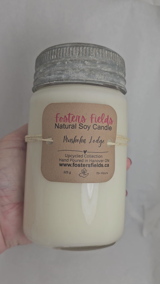 video showcasing a soy jar that is old fashioned with a metal and glass lid. white soy wax