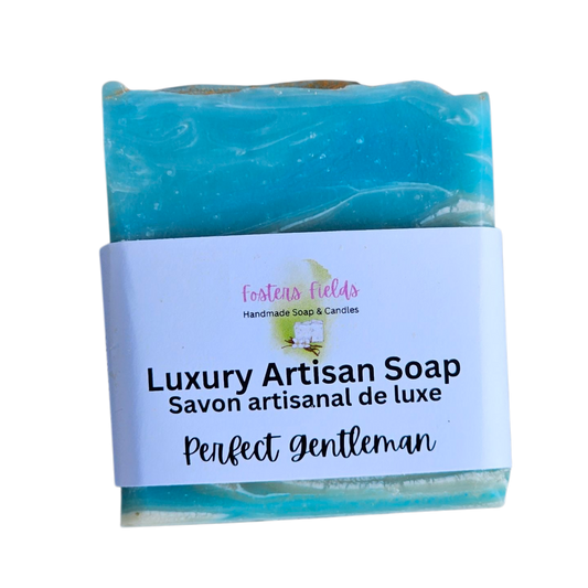 Luxury artisanal soap with a blue and green swirl pattern on a white background, blue and white swirled soap, gentlemans soap