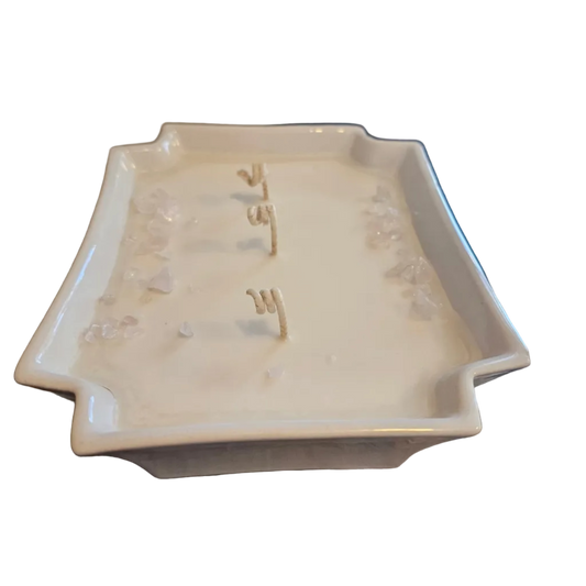 Upcycled soy candle poured into a white bowl with 3 wicks