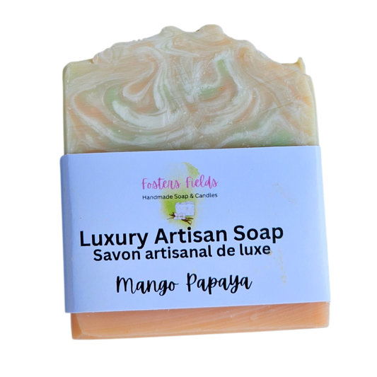 Luxury Artisan Soap with a label on a white background, Mango Papaya, orange and green swirls