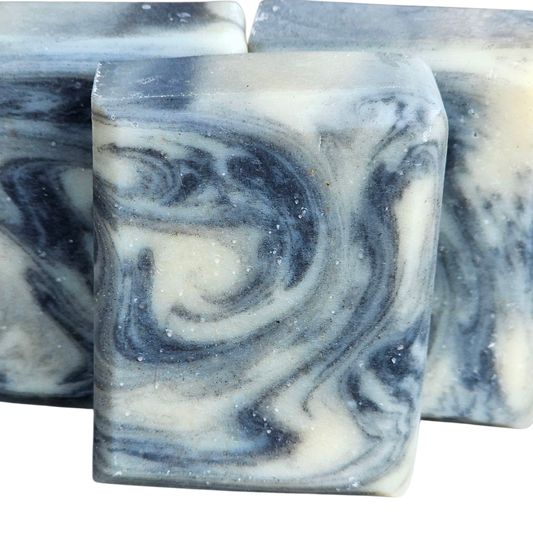 Three marbled soap bars on a white background, facial bar, ahndmade, charcoal bar