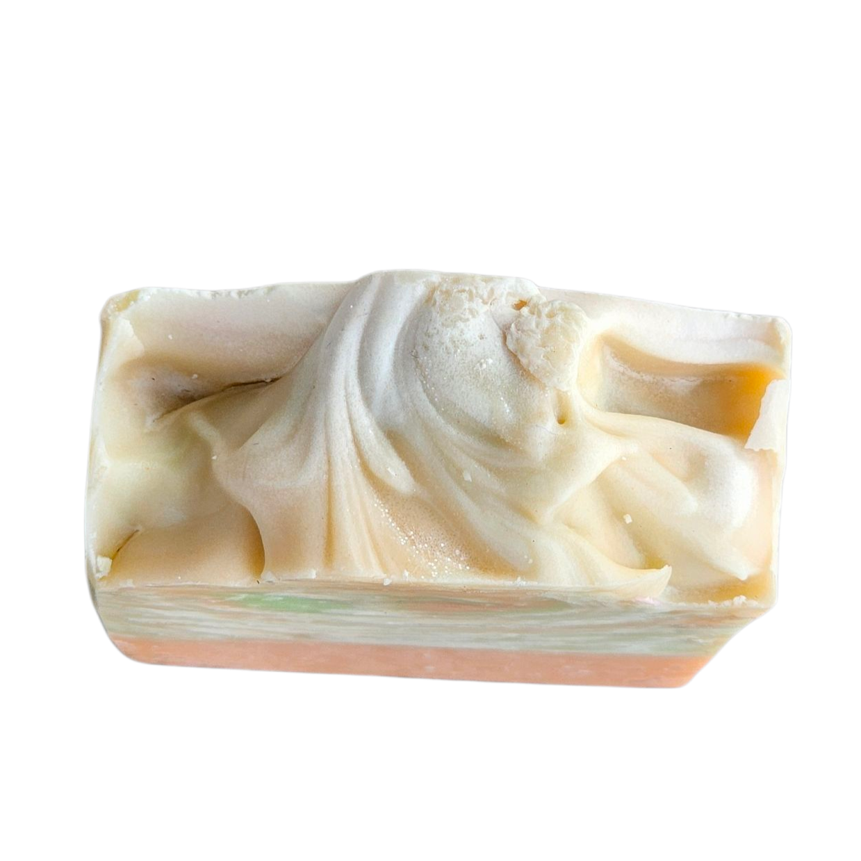 Swirled soap bar on a white background, top view, Mango Papaya