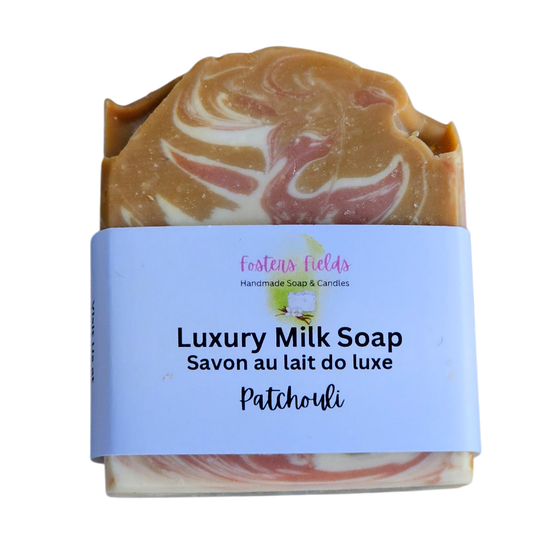 Luxury milk soap with a swirled design on a white background, Pathouli handmade soap, neutral colors