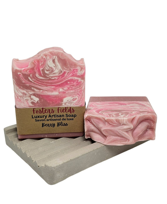 Various shades of pink and white, handmade soap scented in sweet berries